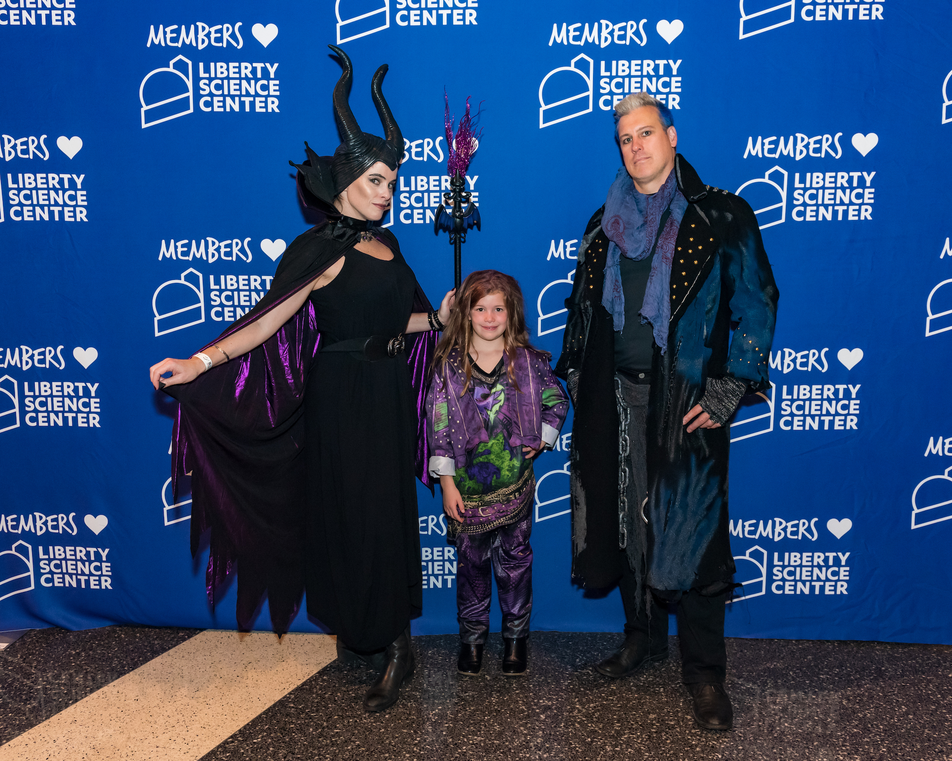 Guests in Maleficent costumes