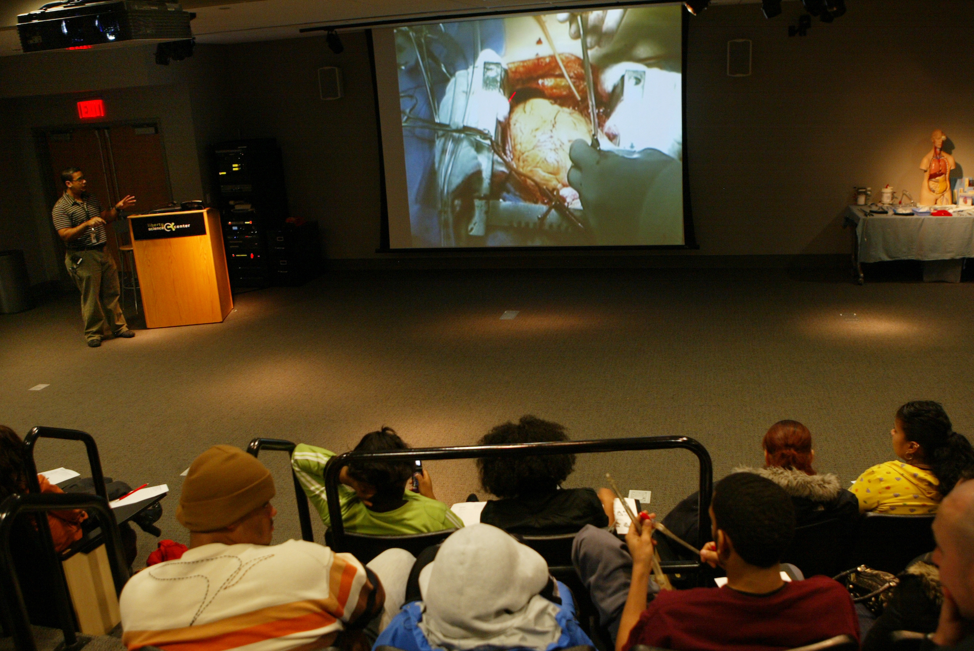 Students watching live on-screen surgery