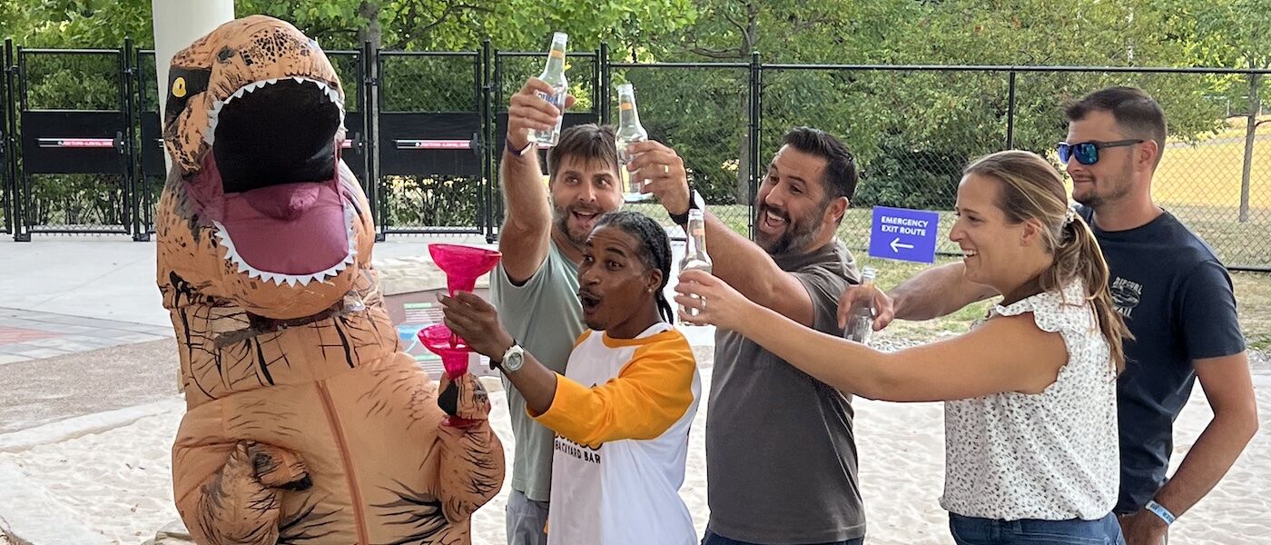 Bones the T-Rex has a drink with friends