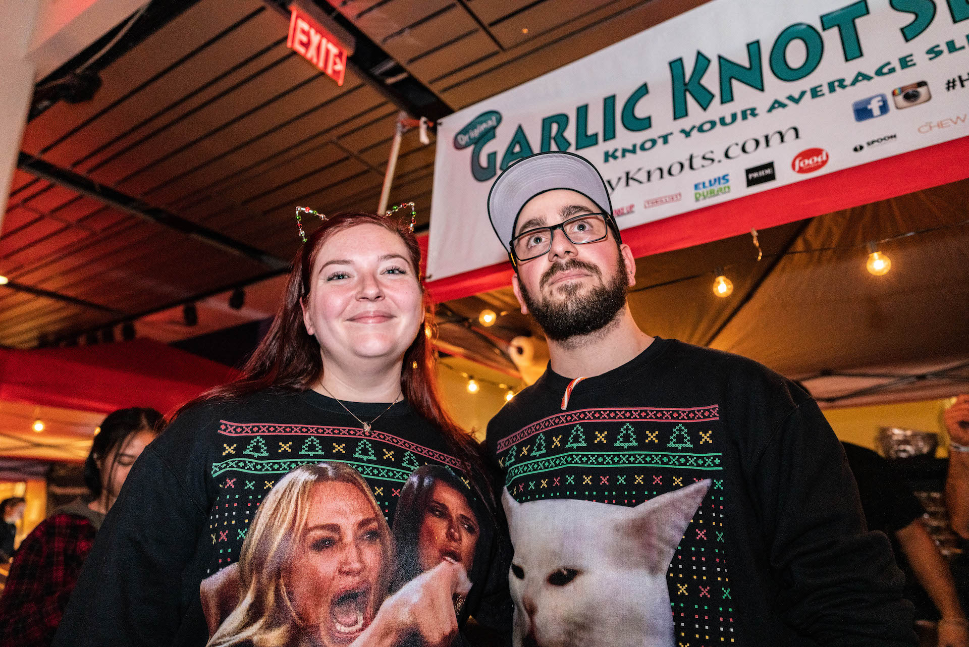 Guests wearing ugly sweaters at LSC After Dark: Candyland