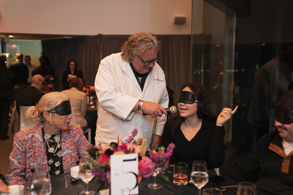 Chef David Burke with blindfolded dinner guests