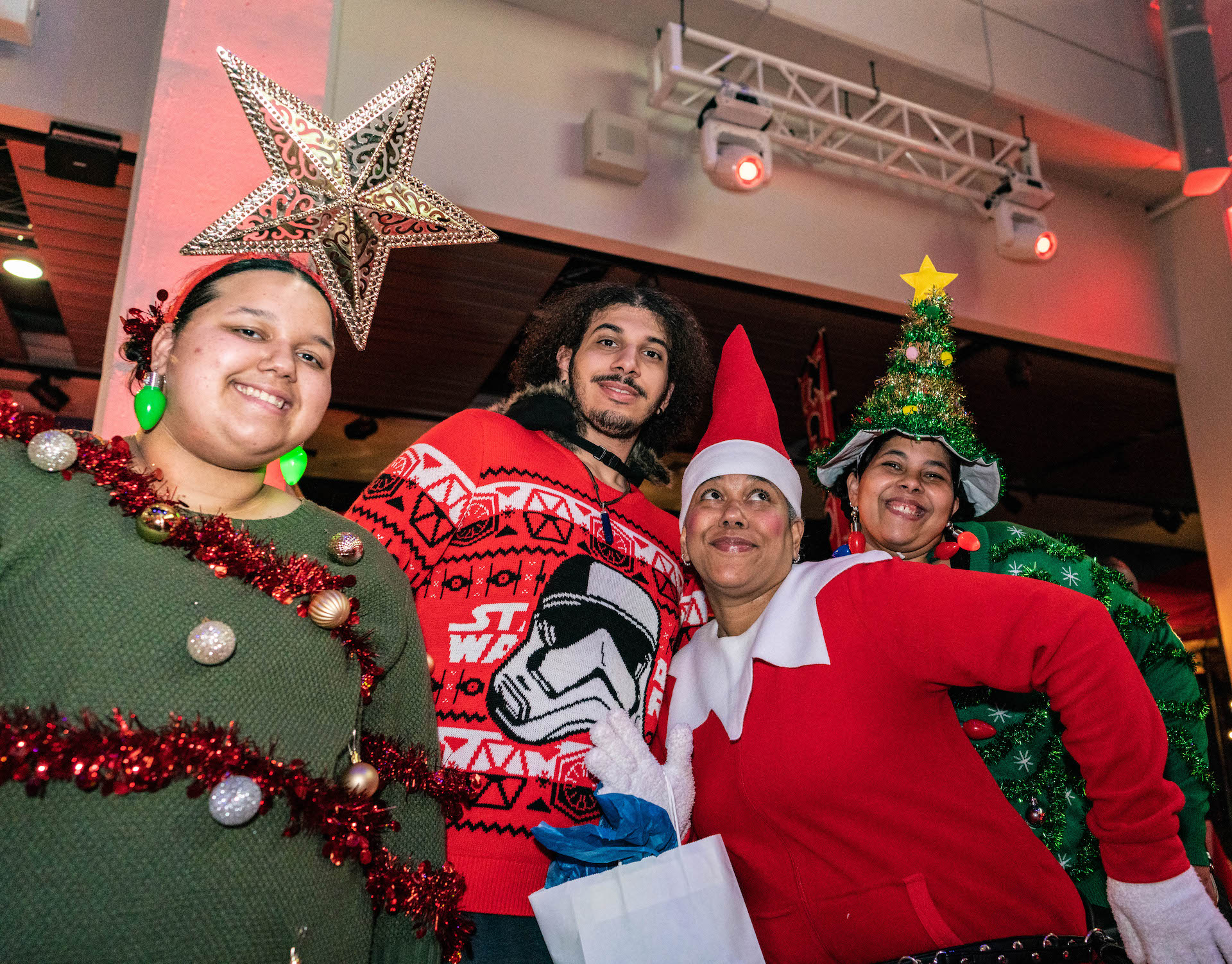 Guests wearing ugly sweaters at LSC After Dark: Candyland