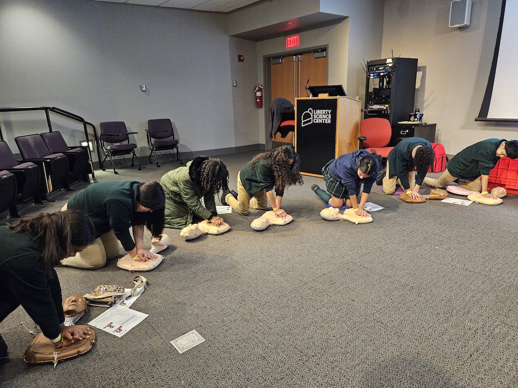 Students participate in CPR demo
