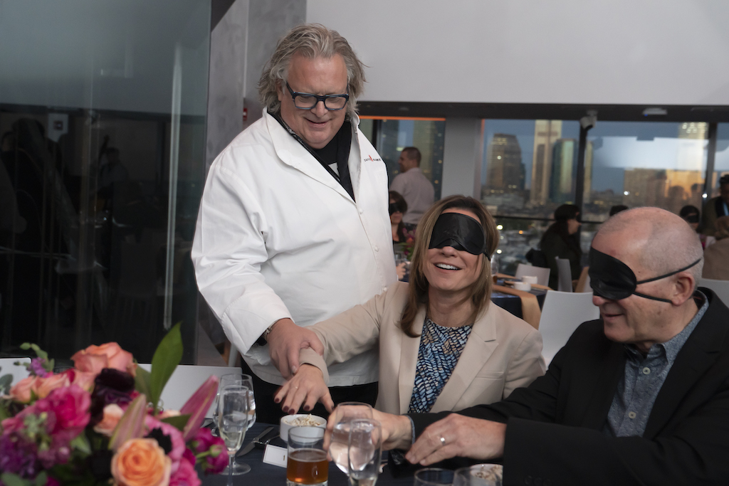 Chef David Burke with blindfolded dinner guests