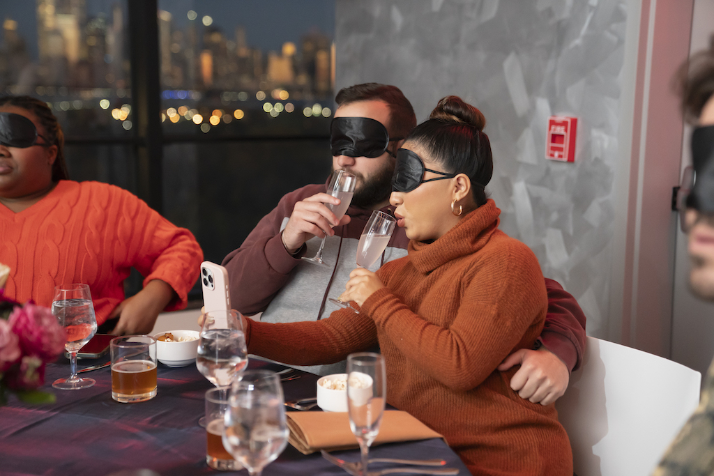 Blindfolded dinner guests