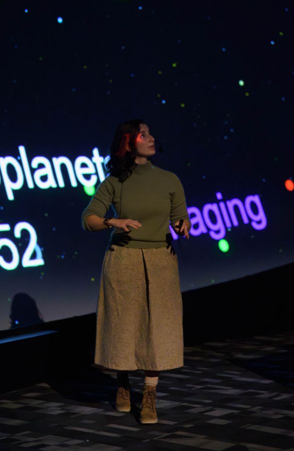 Dr. Clara Sousa-Silva in the planetarium