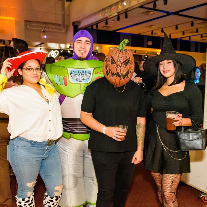 Guests in costume at LSC After Dark: Boos & Brews